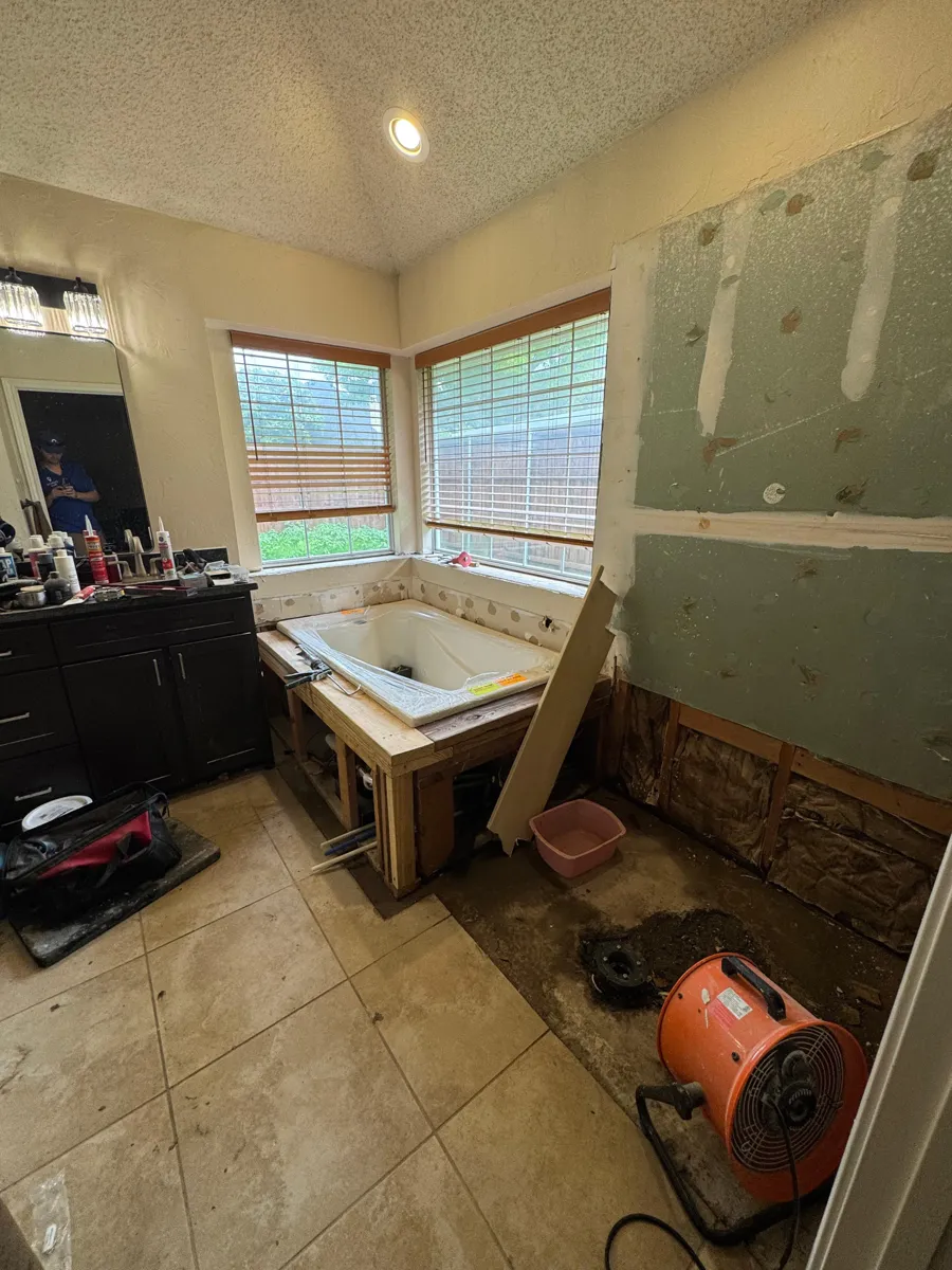 OnPoint Pros mid-remodel in Plano TX — new tub set, cement board waterproofing before tile